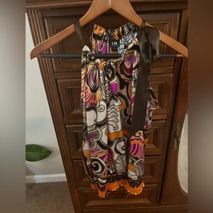 Pretty multicolor IN San Francisco halter top! Beautiful colors very flattering!